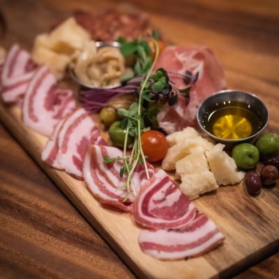 raw meat on brown wooden chopping board