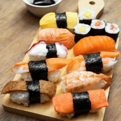 sushi on wooden platter