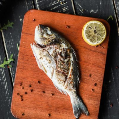 fish on brown wooden chopping board