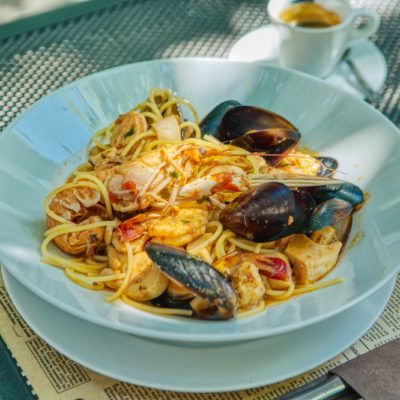 pasta with shrimp on white ceramic plate