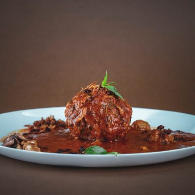 cooked meat on white ceramic plate